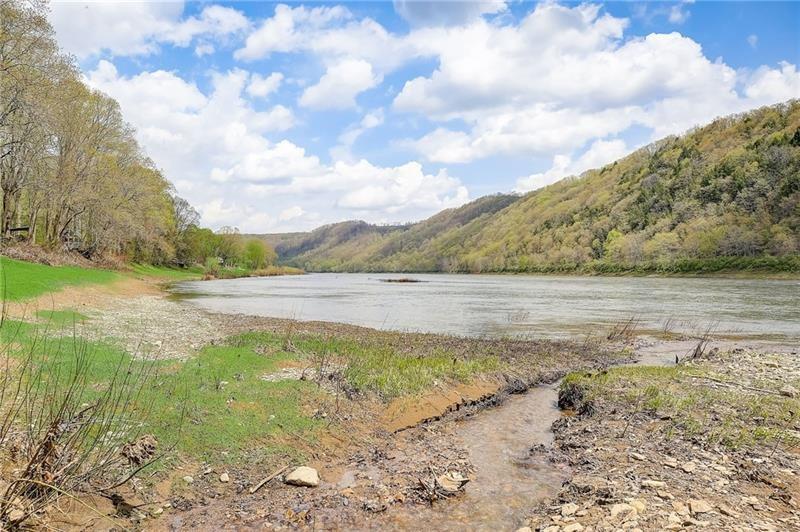 952 Seybertown Road East Brady, PA 16028 - Photo 46 of 46 a view of a lake with a big yard