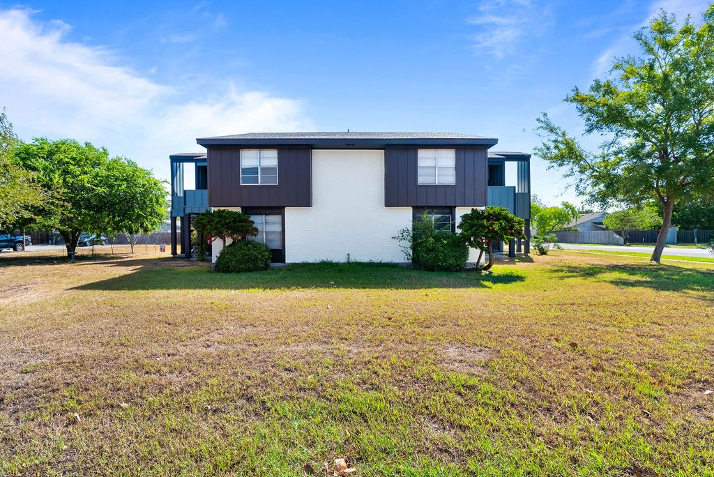 a house view with a garden space
