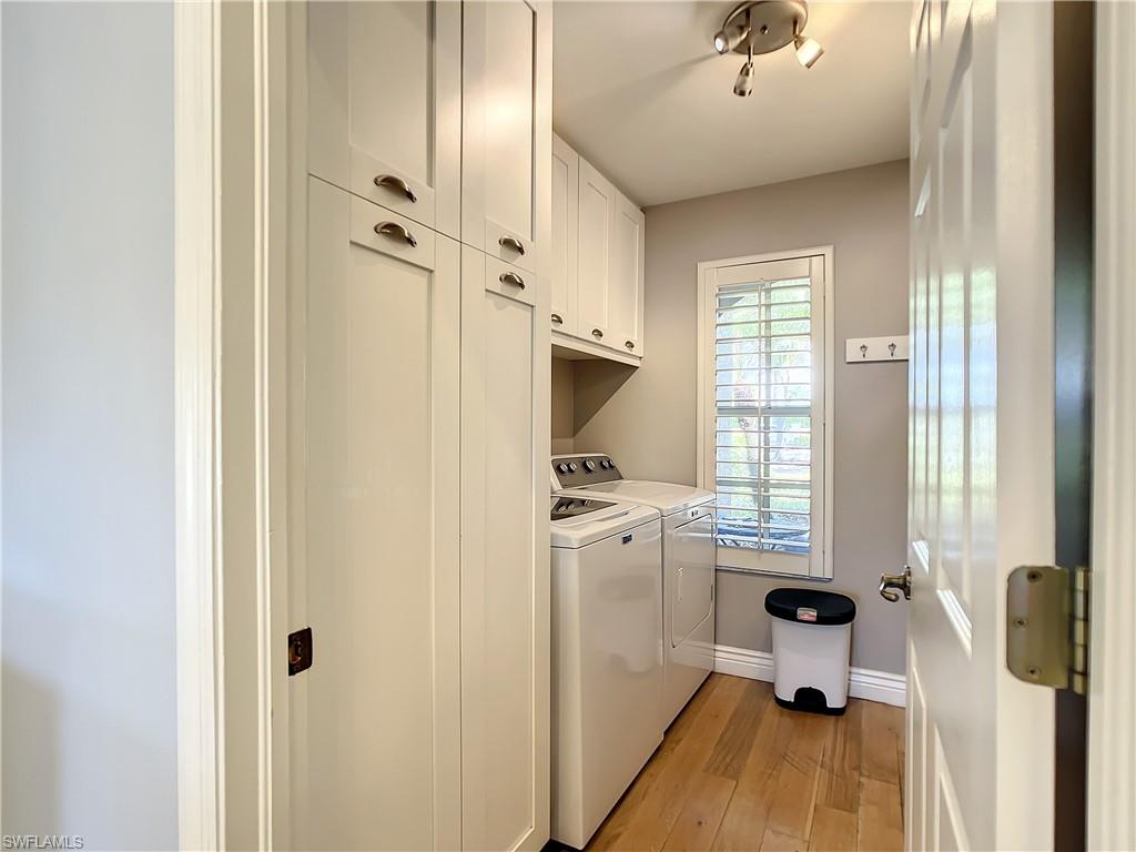 7858 Gardner Drive Naples, FL 34109 - Photo 32 of 35 a view of a bathroom with a tub and shower