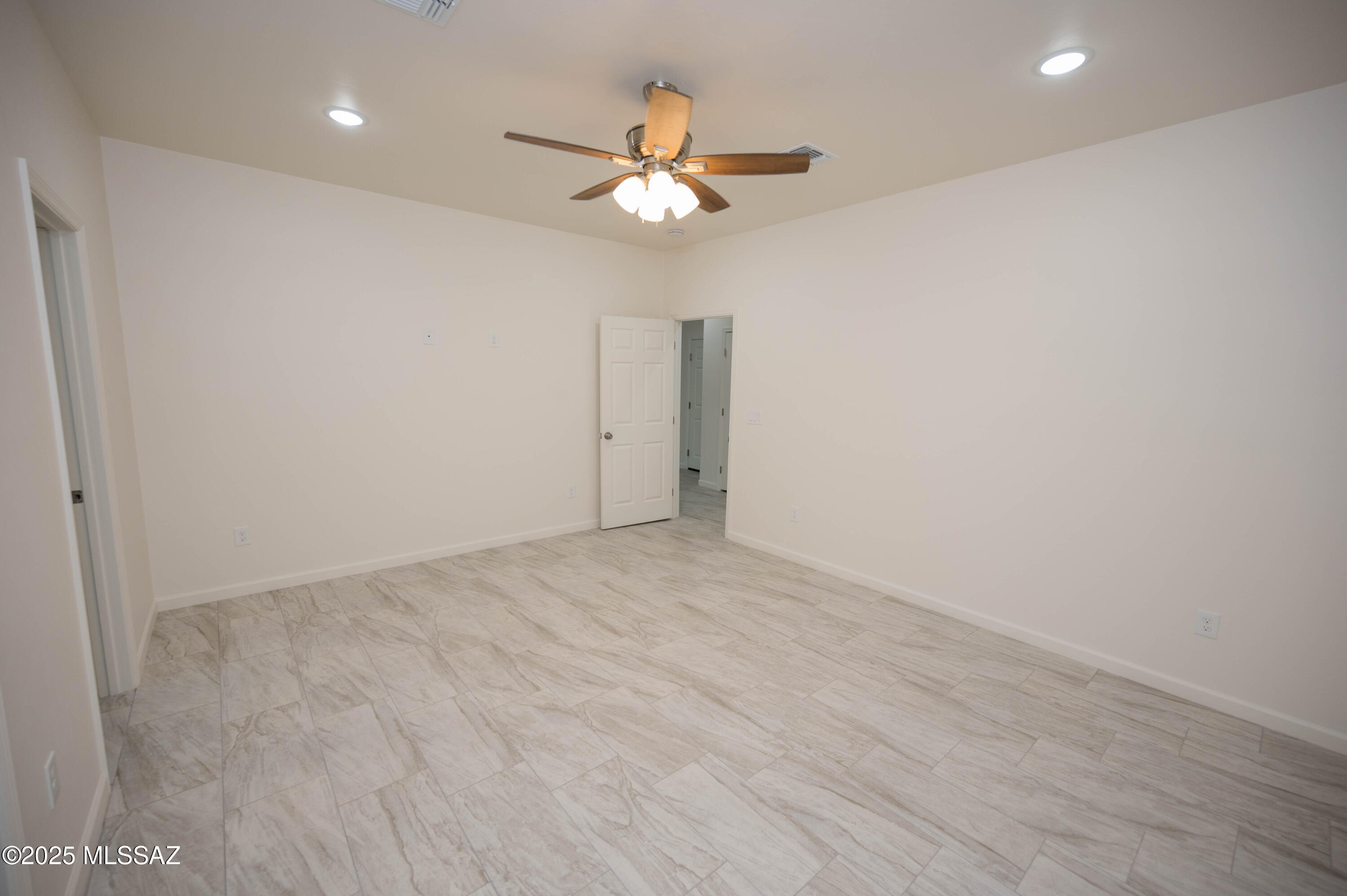 497 Calle Cipres Rio Rico, AZ 85648 - Photo 43 of 50 a view of an empty room with a window