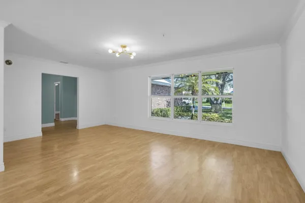 a view of an empty room with a window