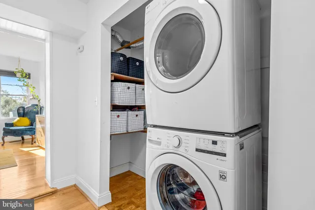 a view of livingroom with washer and dryer