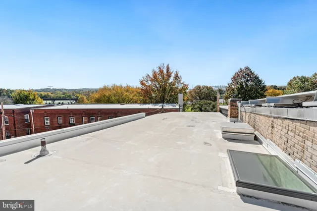 a view of balcony with two chairs