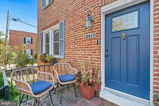 a view of a chair and table in the patio