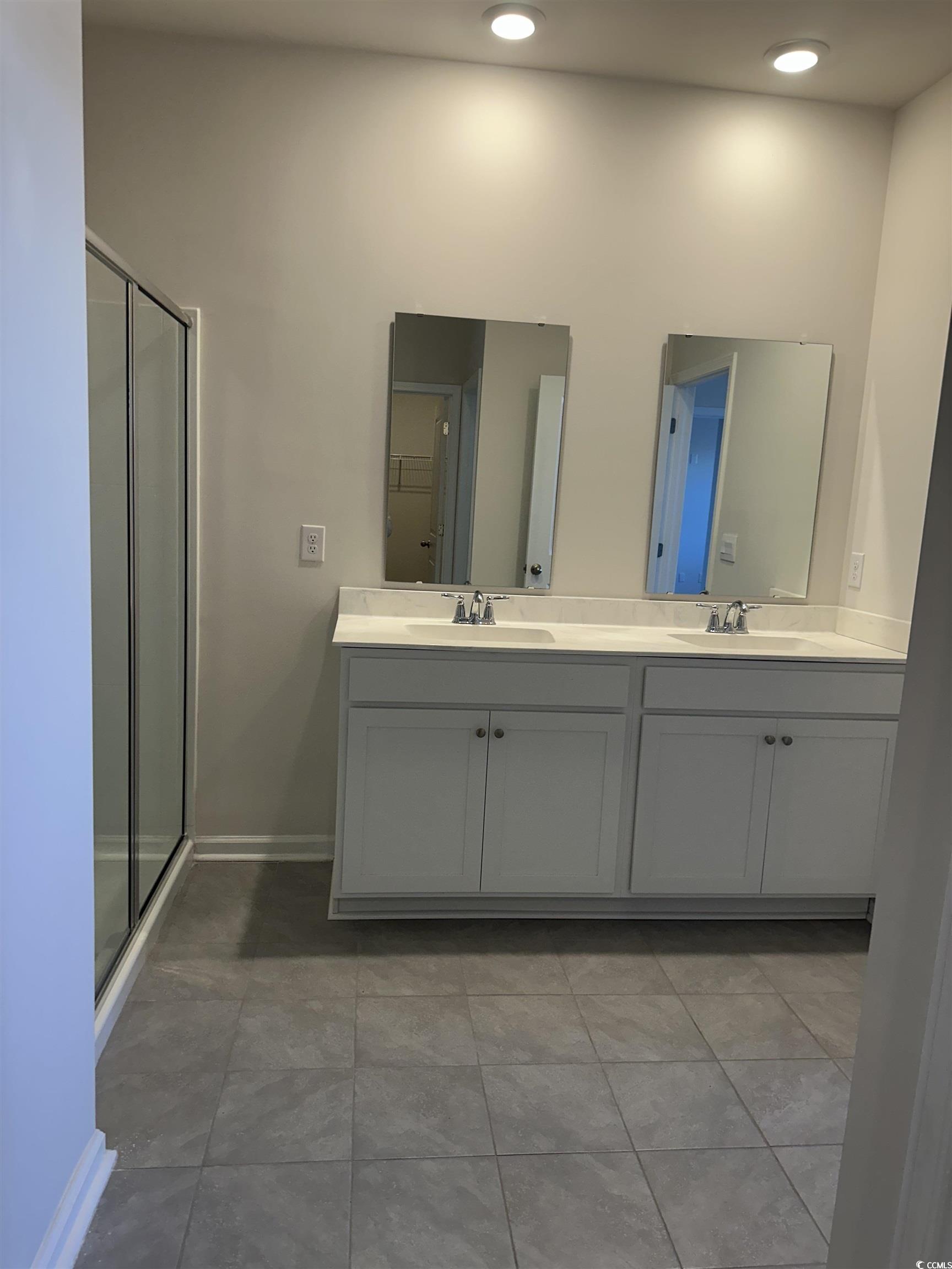3789 Bells Lk Circle Longs, SC 29568 - Photo 14 of 26 Full bathroom featuring double vanity and a stall shower