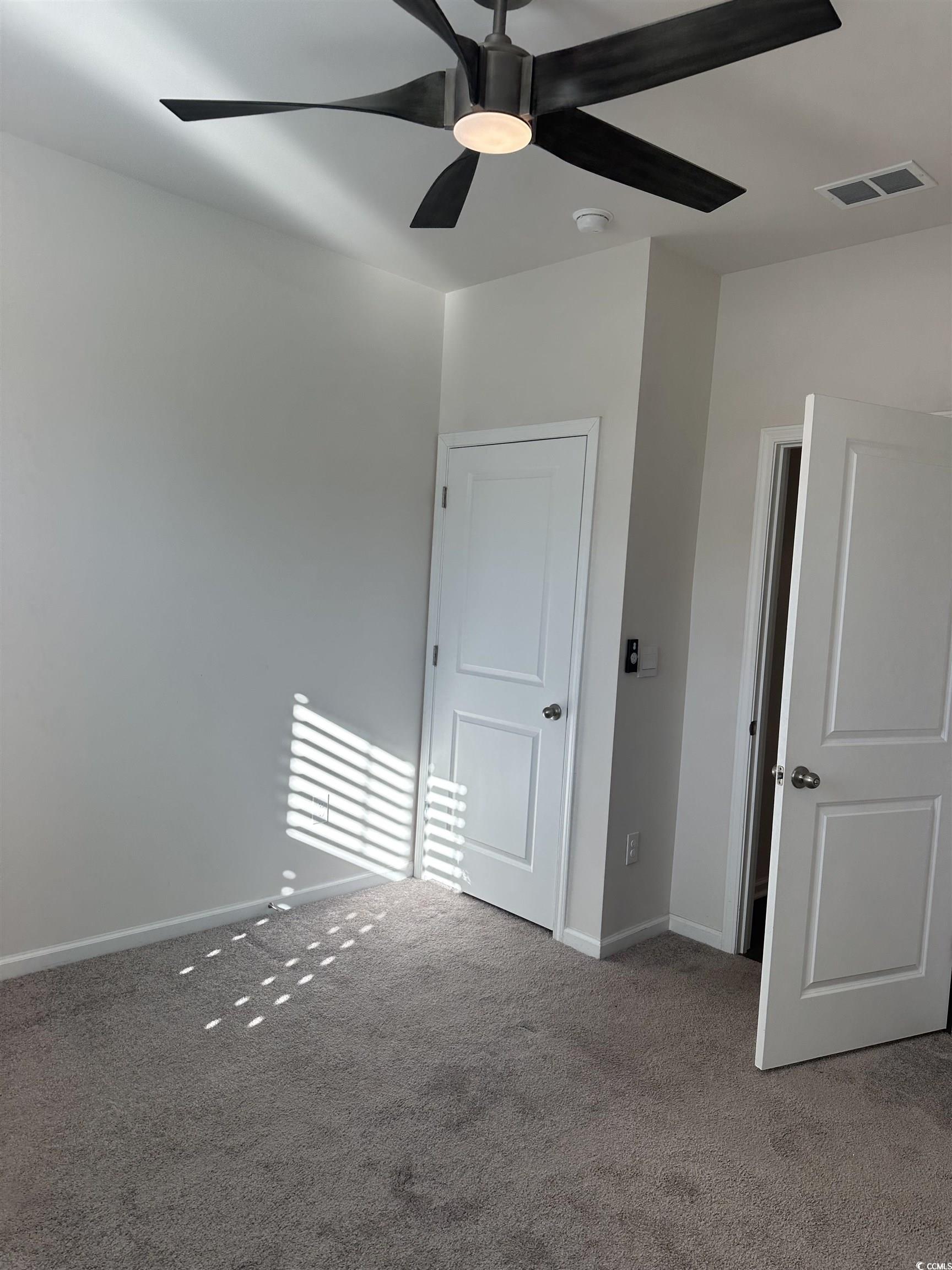 3789 Bells Lk Circle Longs, SC 29568 - Photo 18 of 26 Unfurnished bedroom with carpet flooring and ceiling fan
