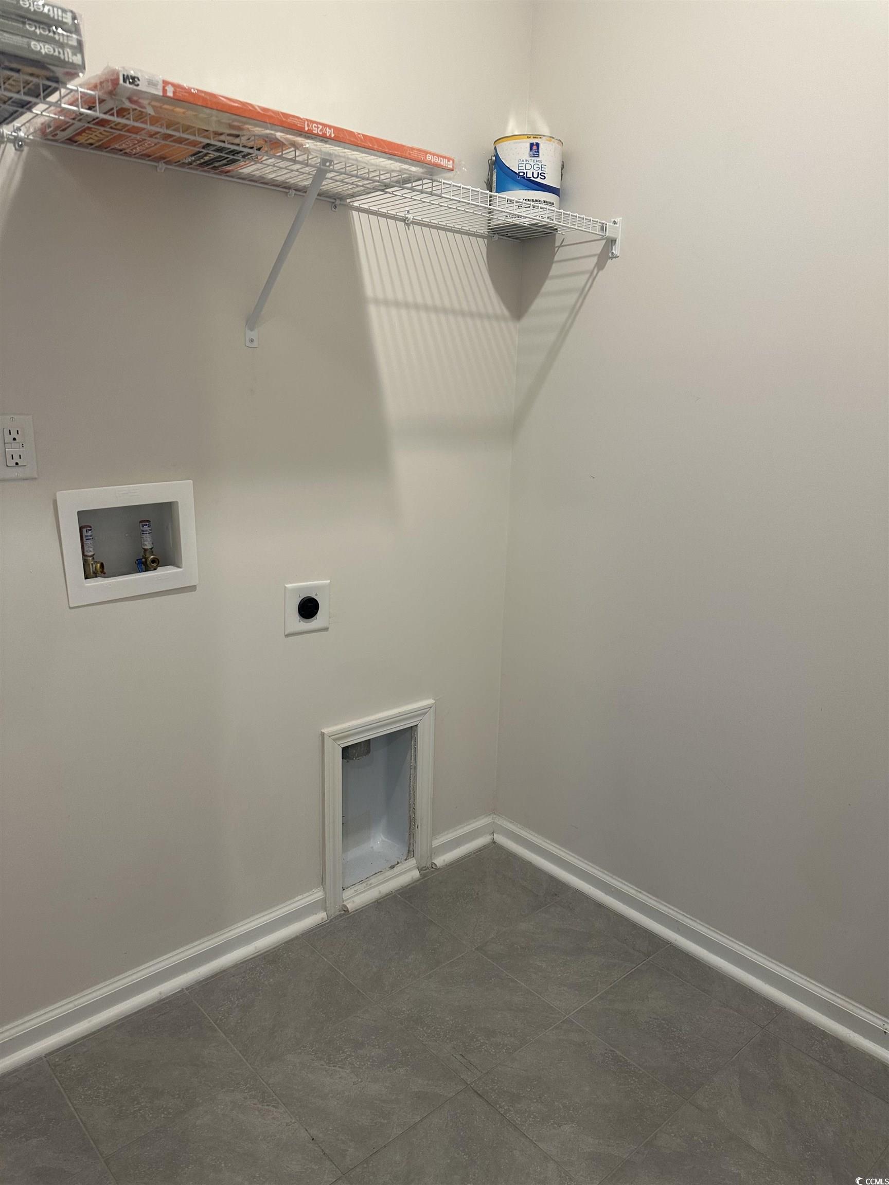 3789 Bells Lk Circle Longs, SC 29568 - Photo 21 of 26 Laundry area with hookup for a washing machine, hookup for an electric dryer, and dark tile patterned floors