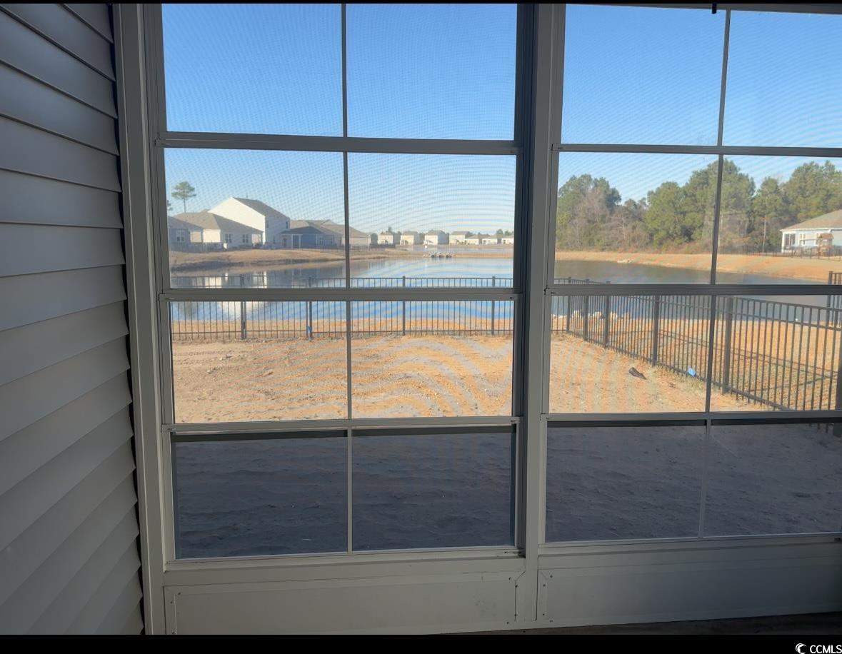 3789 Bells Lk Circle Longs, SC 29568 - Photo 23 of 26 Doorway to outside with a water view