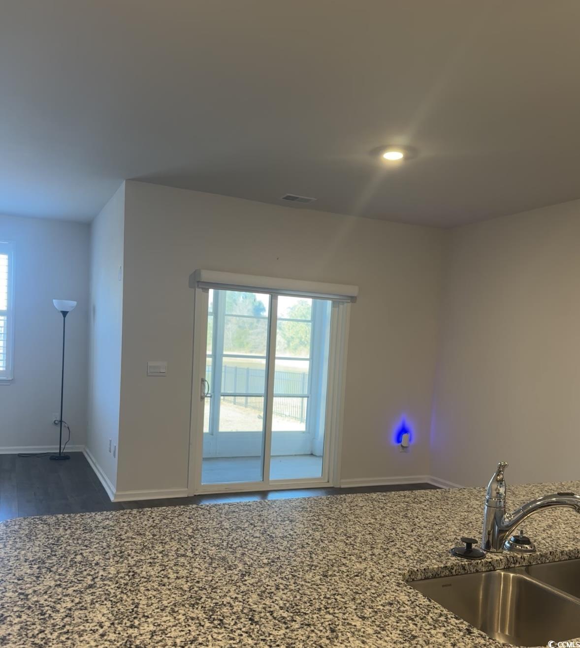 3789 Bells Lk Circle Longs, SC 29568 - Photo 6 of 26 Kitchen with healthy amount of natural light and light stone counters