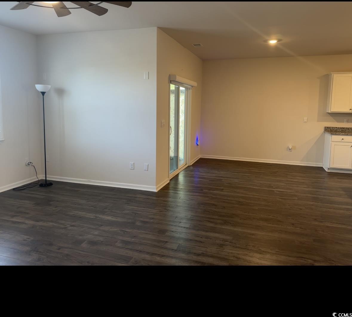 3789 Bells Lk Circle Longs, SC 29568 - Photo 8 of 26 Empty room with dark wood-style floors, ceiling fan, and recessed lighting