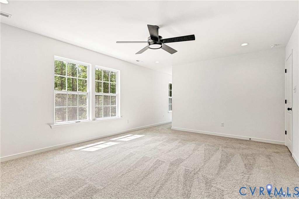 512 Freedom Drive Ruther Glen, VA 22546 - Photo 24 of 36 an empty room with windows