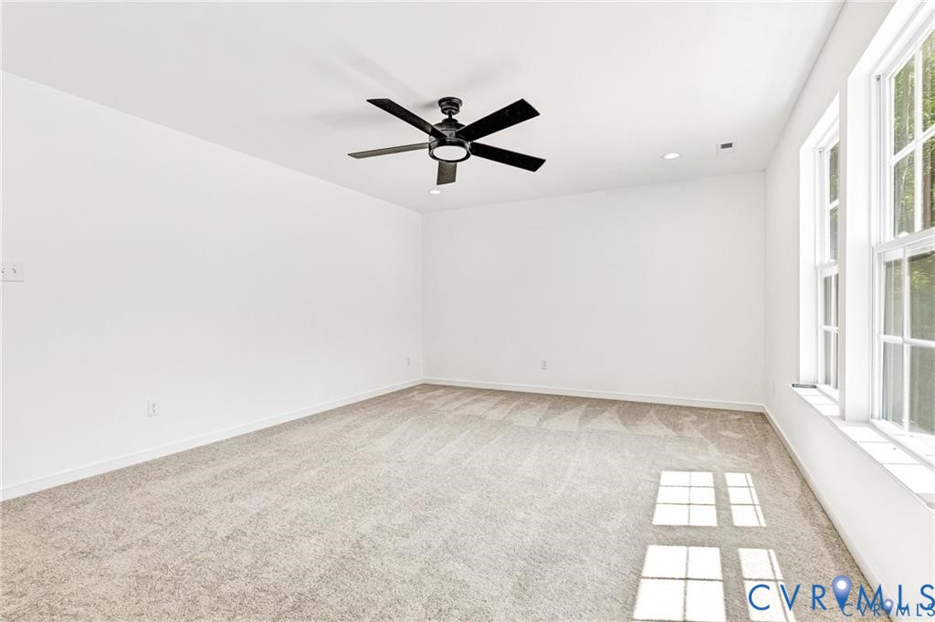 512 Freedom Drive Ruther Glen, VA 22546 - Photo 26 of 36 wooden floor in an empty room with a window