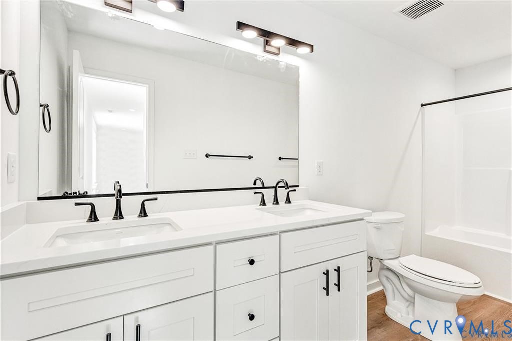 512 Freedom Drive Ruther Glen, VA 22546 - Photo 28 of 36 a bathroom with a sink and a toilet