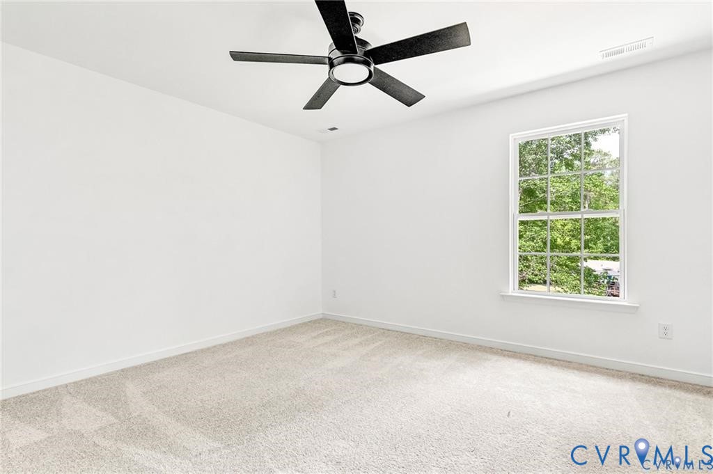 512 Freedom Drive Ruther Glen, VA 22546 - Photo 32 of 36 an empty room with a window