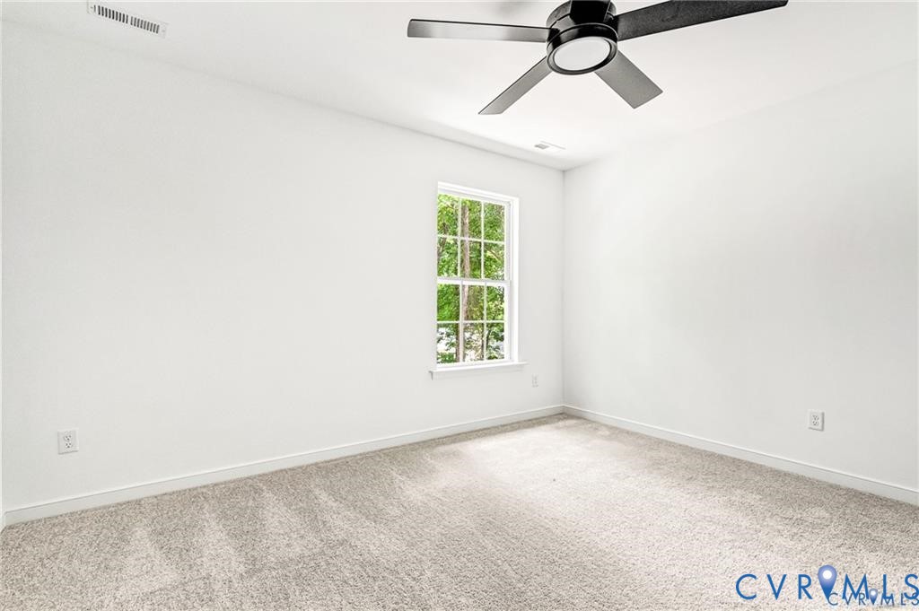 512 Freedom Drive Ruther Glen, VA 22546 - Photo 34 of 36 a view of an empty room with a window