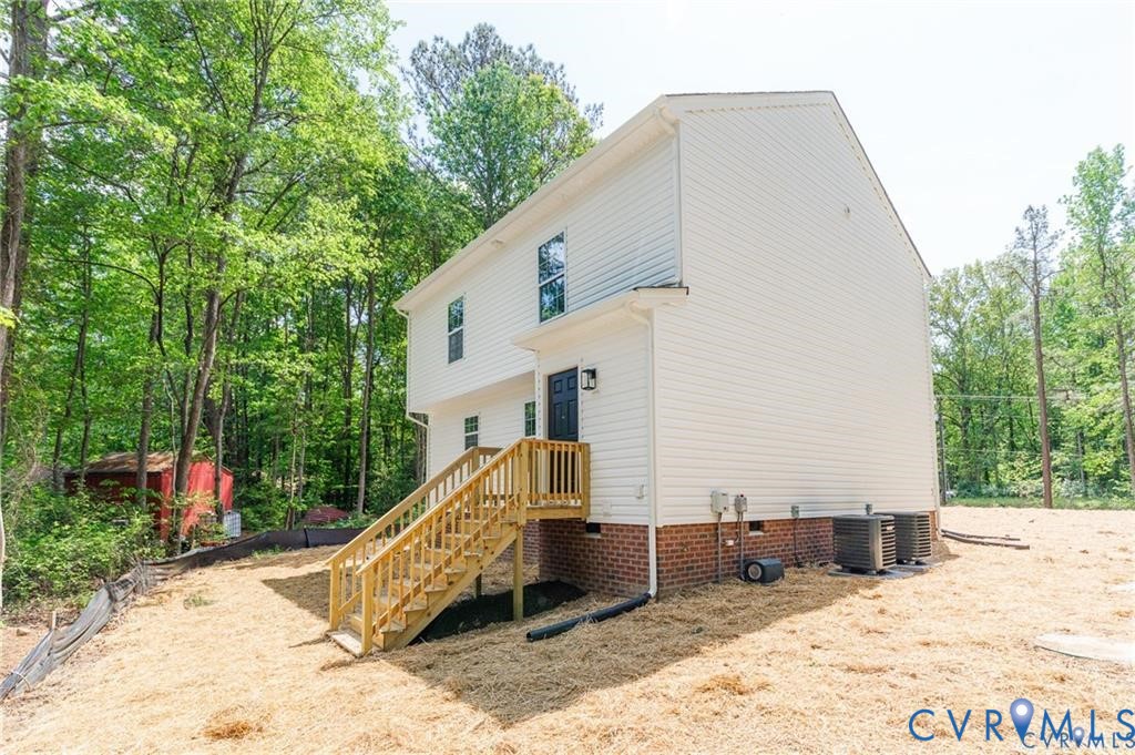 512 Freedom Drive Ruther Glen, VA 22546 - Photo 36 of 36 a roof deck with table and chairs