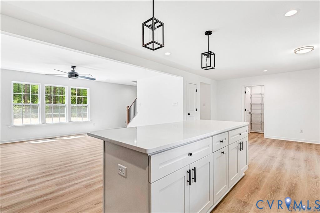 512 Freedom Drive Ruther Glen, VA 22546 - Photo 10 of 36 a kitchen with a sink and wooden floor