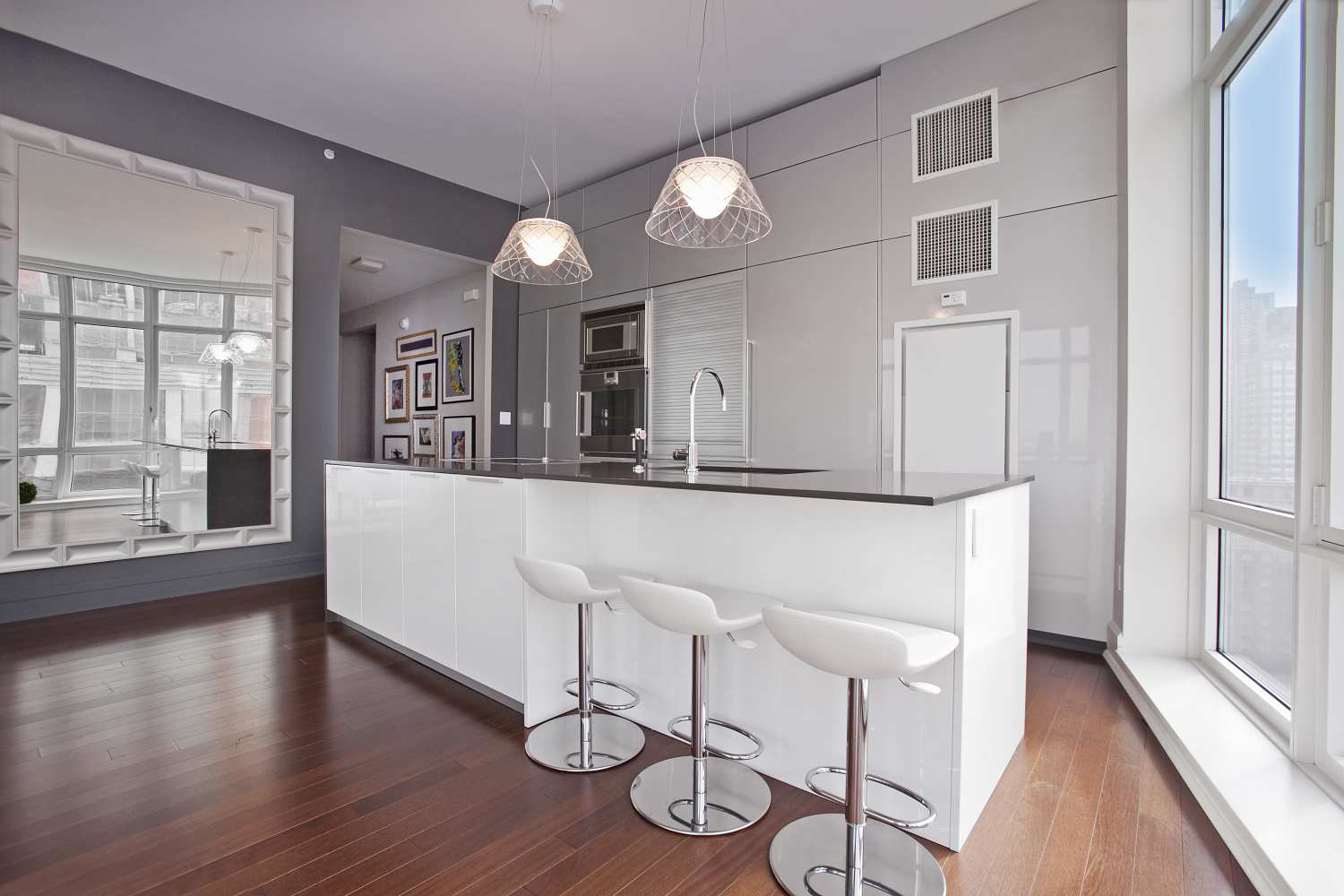 60 Riverside Boulevard, Unit 2011 Manhattan, NY 10069 - Photo 6 of 6 a living room with furniture and a large window