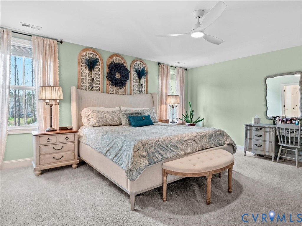 16106 Cambian Lane Chesterfield, VA 23832 - Photo 30 of 50 a spacious bedroom with a bed and a table