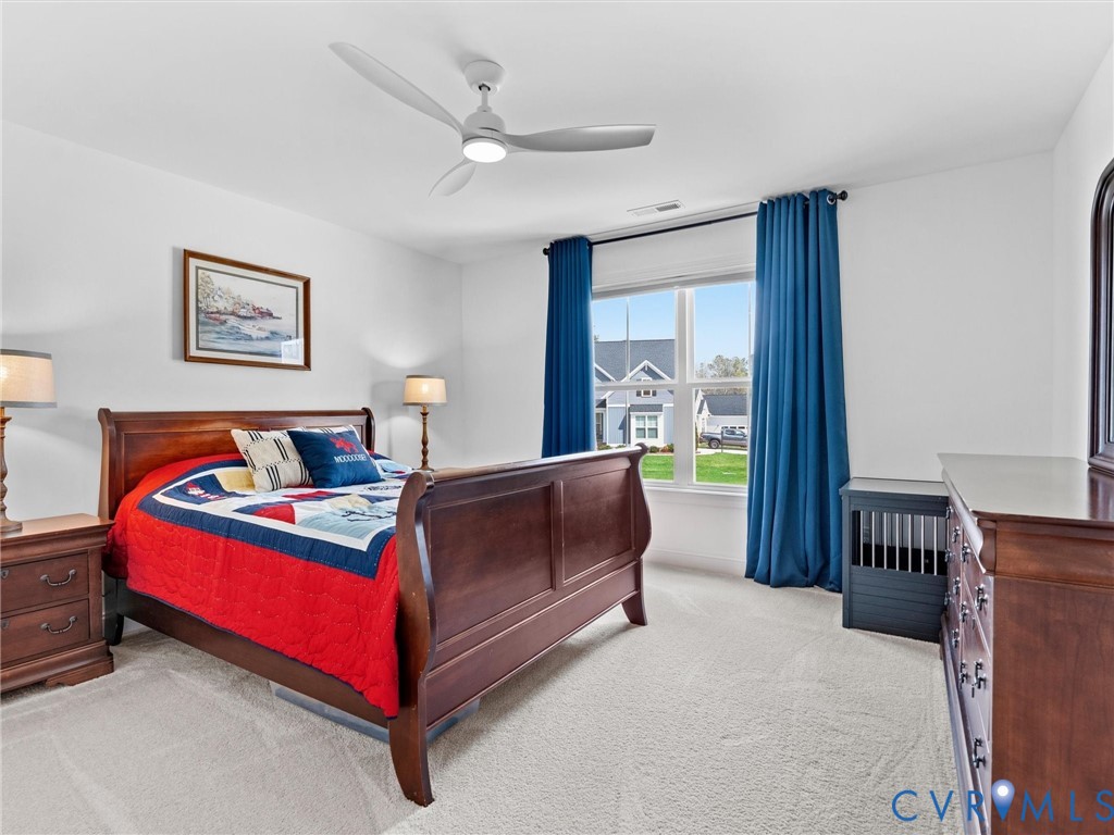 16106 Cambian Lane Chesterfield, VA 23832 - Photo 38 of 50 a bedroom with a bed and a large window