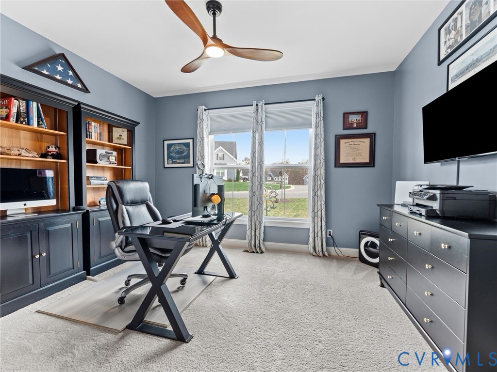 16106 Cambian Lane Chesterfield, VA 23832 - Photo 41 of 50 a work room with furniture and a flat screen tv