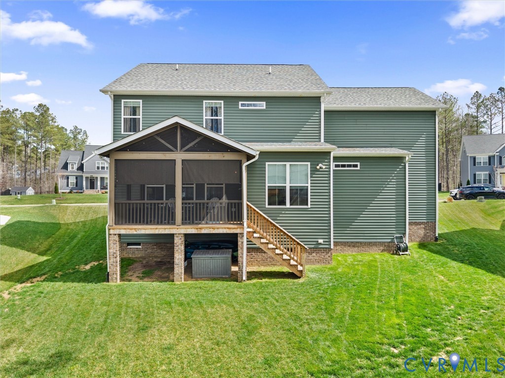 16106 Cambian Lane Chesterfield, VA 23832 - Photo 44 of 50 a front view of a house with a yard