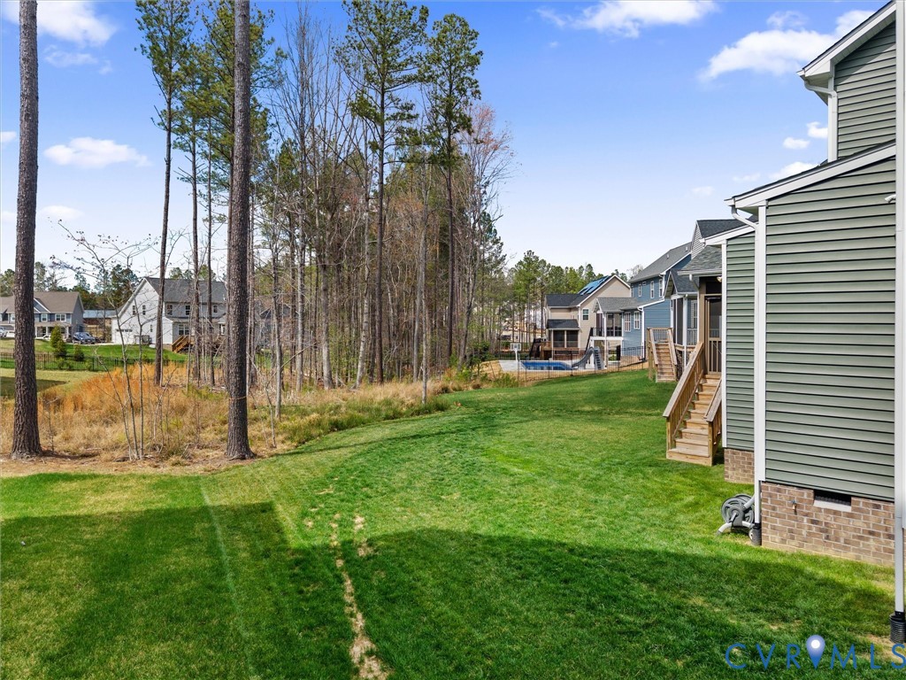 16106 Cambian Lane Chesterfield, VA 23832 - Photo 45 of 50 a view of a garden with a small yard