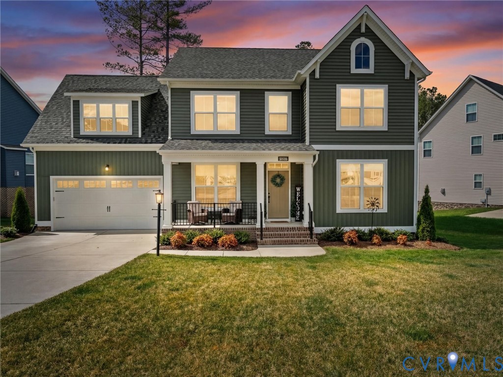 16106 Cambian Lane Chesterfield, VA 23832 - Photo 46 of 50 a front view of a house with a yard