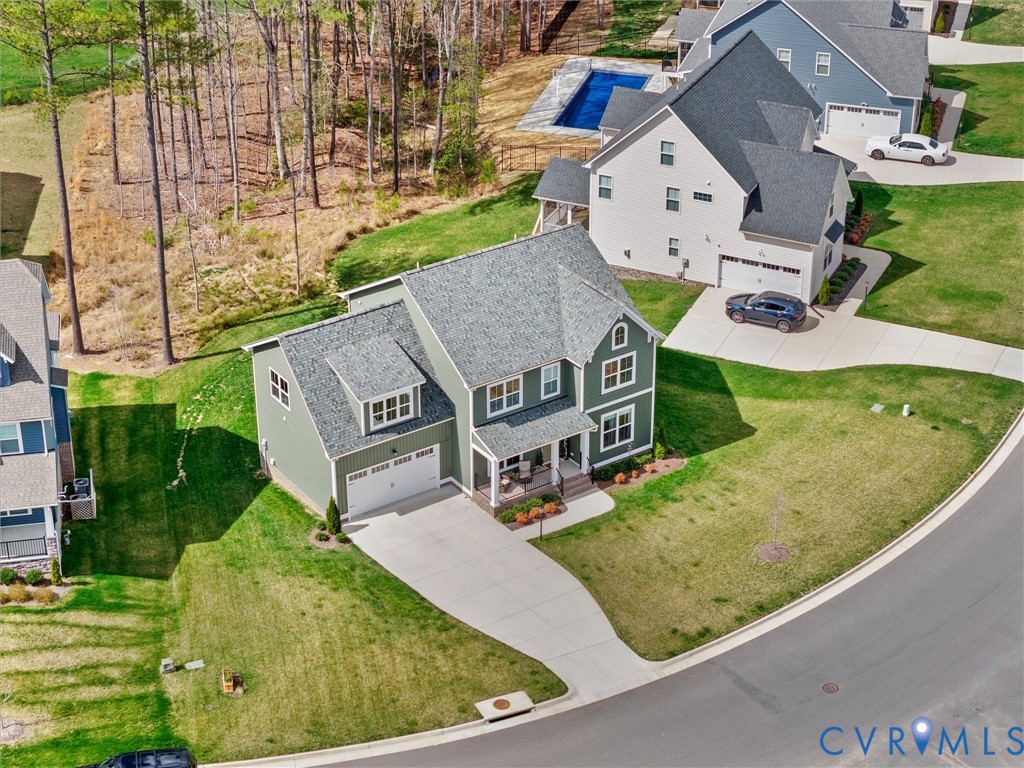 16106 Cambian Lane Chesterfield, VA 23832 - Photo 47 of 50 an aerial view of residential houses with outdoor space and parking