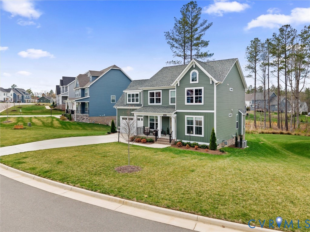 16106 Cambian Lane Chesterfield, VA 23832 - Photo 5 of 50 a front view of a house with a yard