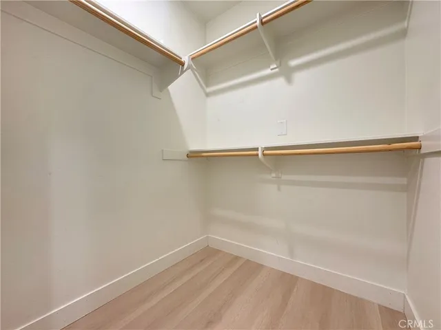 a view of an empty walk in closet