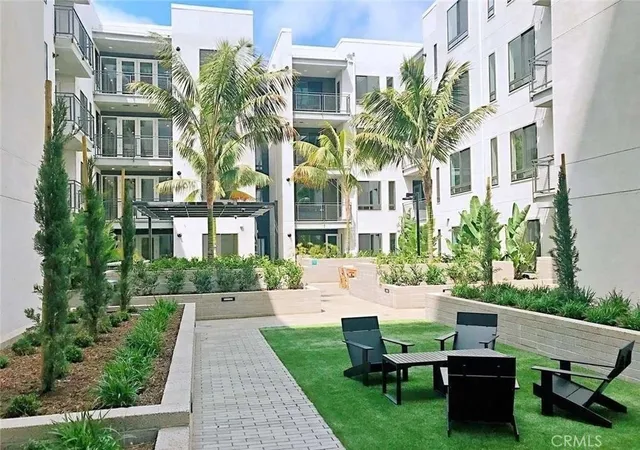 a view of a patio front of house