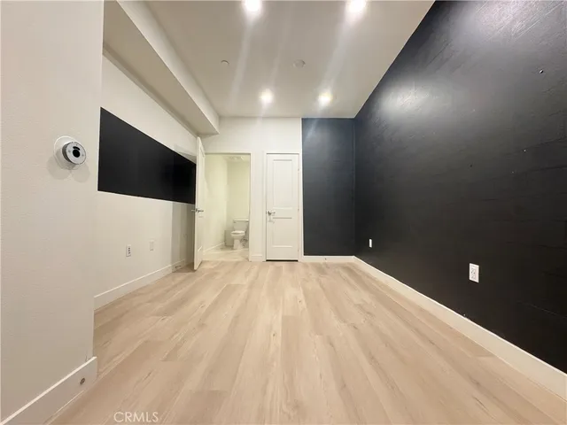 a view of a livingroom with a flat screen tv