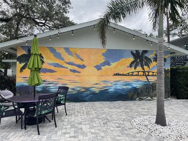 a view of a swimming pool with a patio