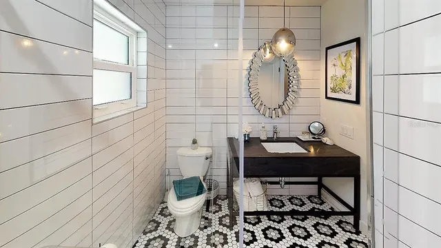 a bathroom with a sink and a toilet