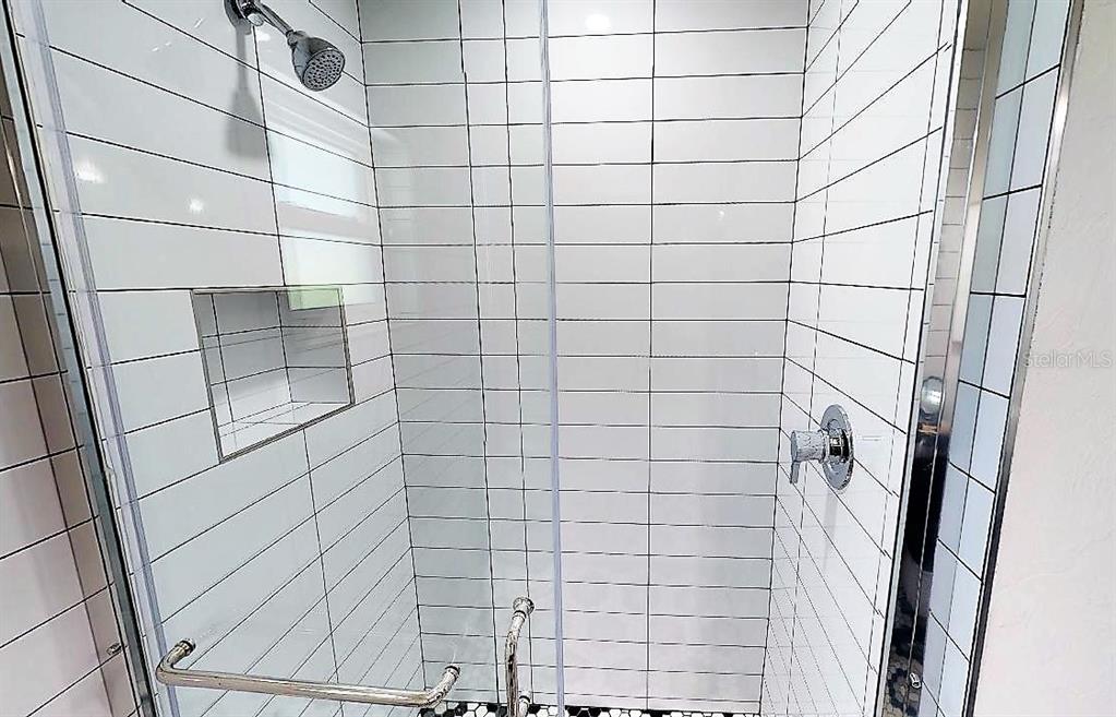 1912 Morrill Street, Unit LIME Sarasota, FL 34236 - Photo 34 of 34 a bathroom with a shower