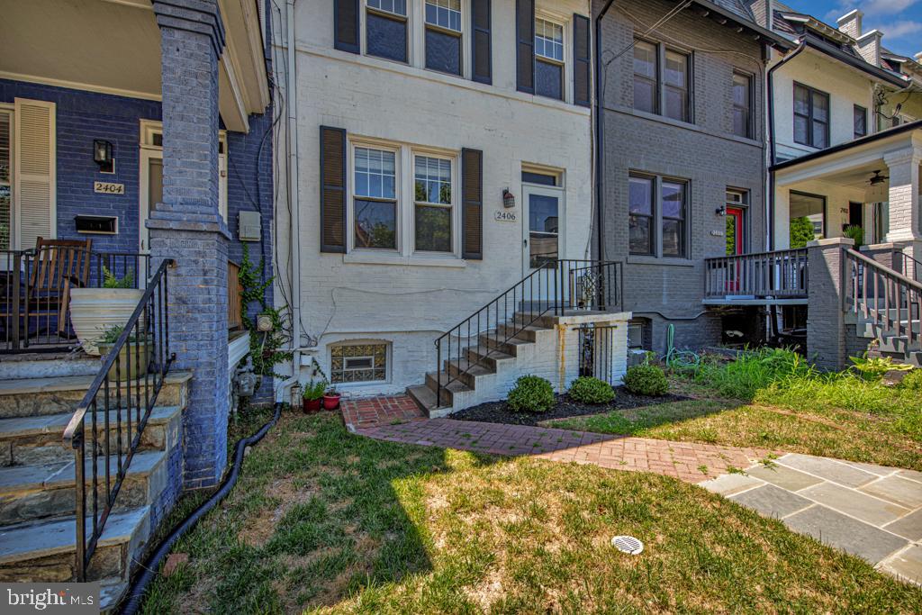 2406 37th Street Northwest Washington, DC 20007 - Photo 2 of 44 a aerial view of a house with a yard