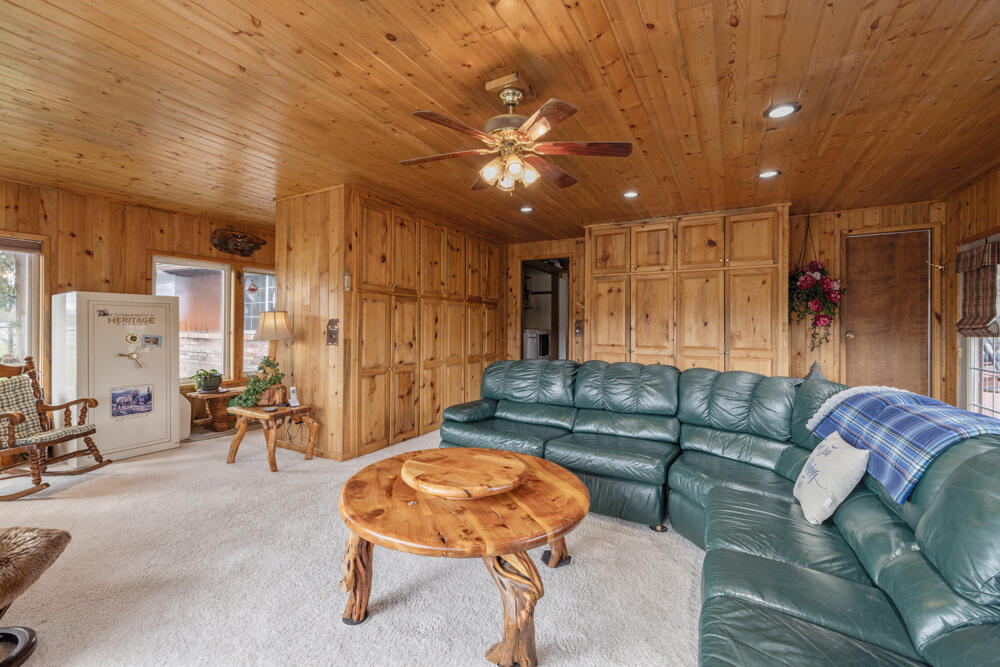 47477 Gerber Road Bonanza, OR 97623 - Photo 61 of 63 a living room with furniture and a chandelier