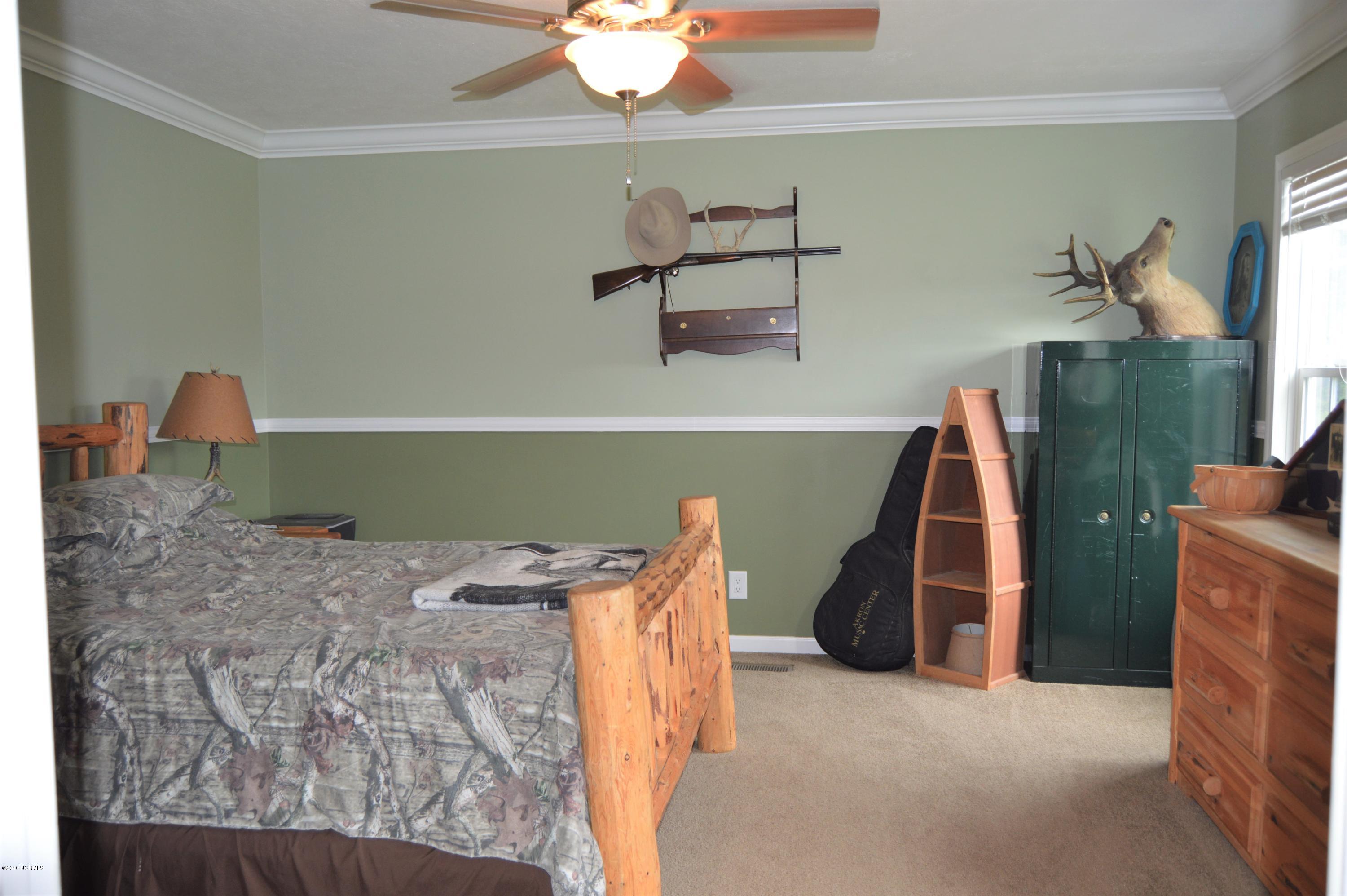 1852 Raccoon Road Willard, NC 28478 - Photo 12 of 34 master bed