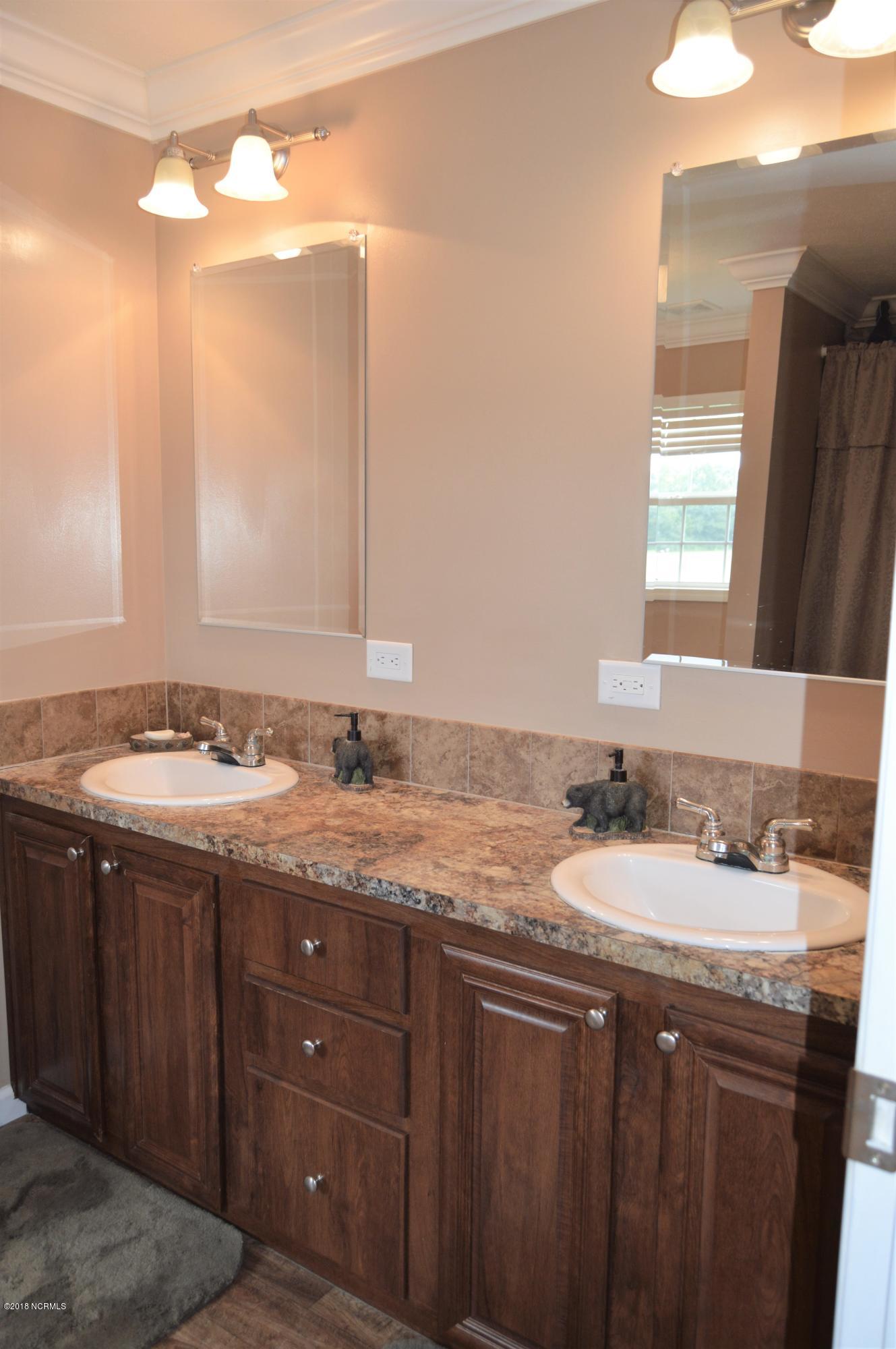 1852 Raccoon Road Willard, NC 28478 - Photo 13 of 34 master bth vanity