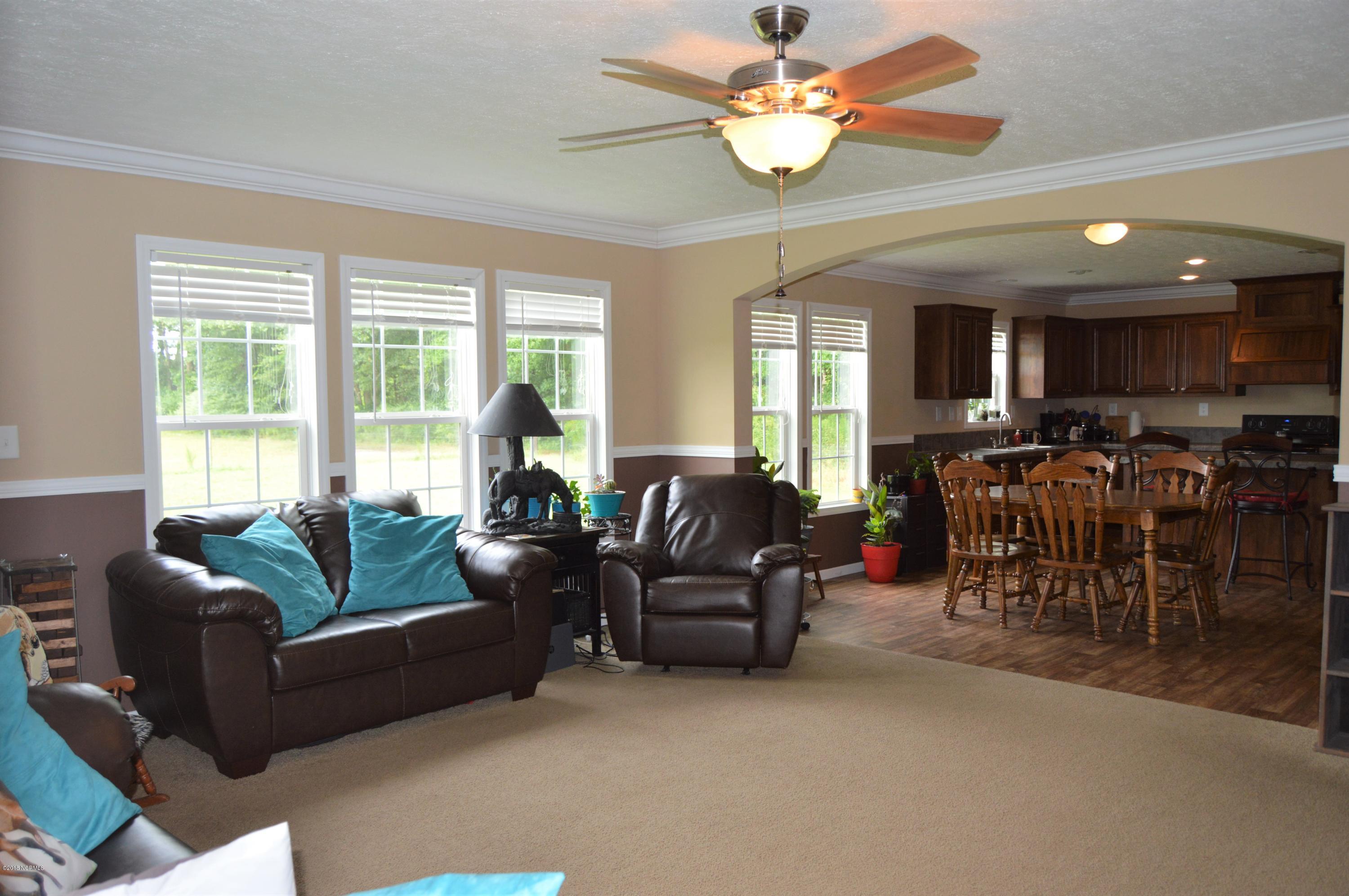 1852 Raccoon Road Willard, NC 28478 - Photo 5 of 34 living dining kitchen