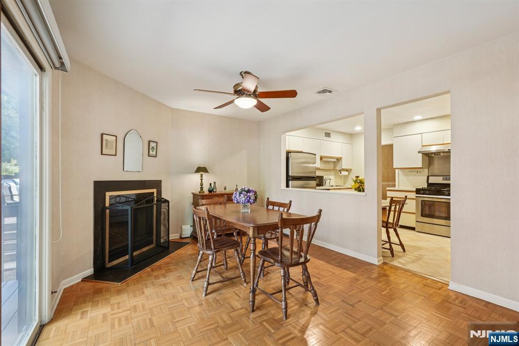 29 Ponds Circle, Unit 15 Wayne, NJ 07470 - Photo 18 of 47 a view of a dining room with furniture
