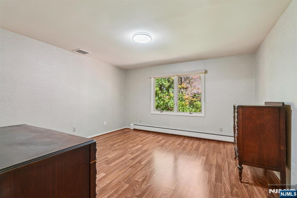 29 Ponds Circle, Unit 15 Wayne, NJ 07470 - Photo 38 of 47 an empty room with a window
