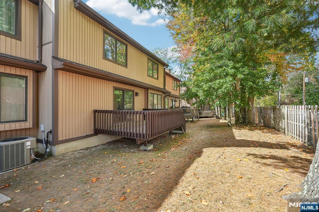 29 Ponds Circle, Unit 15 Wayne, NJ 07470 - Photo 46 of 47 a view of a house with a yard