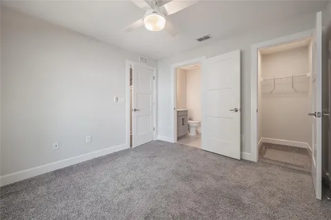 an empty room with a bathroom