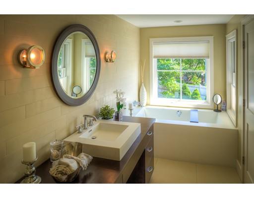 21 Sunset Road Marblehead, MA 01945 - Photo 11 of 21 a bathroom with a sink and a mirror