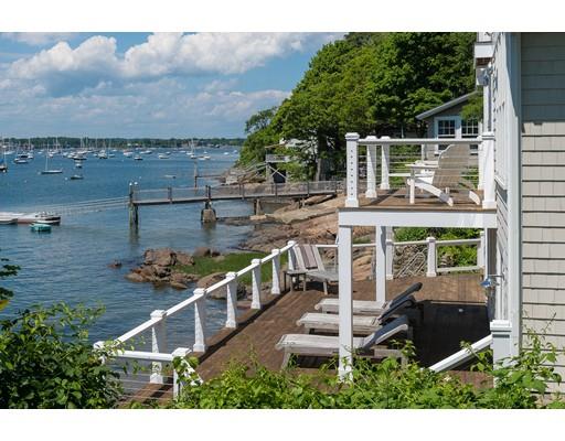 21 Sunset Road Marblehead, MA 01945 - Photo 18 of 21 a view of a chairs and table on the terrace