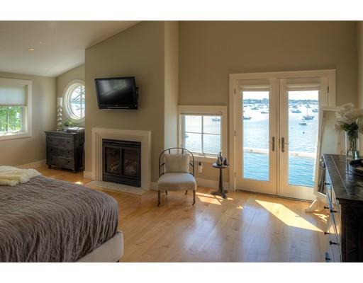 21 Sunset Road Marblehead, MA 01945 - Photo 10 of 21 a spacious bedroom with a bed and a television