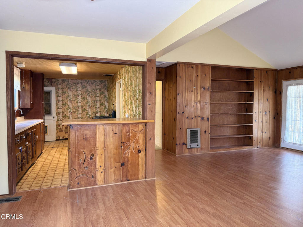 561 Tico Road Ojai, CA 93023 - Photo 13 of 59 wooden floor in an empty room with a window