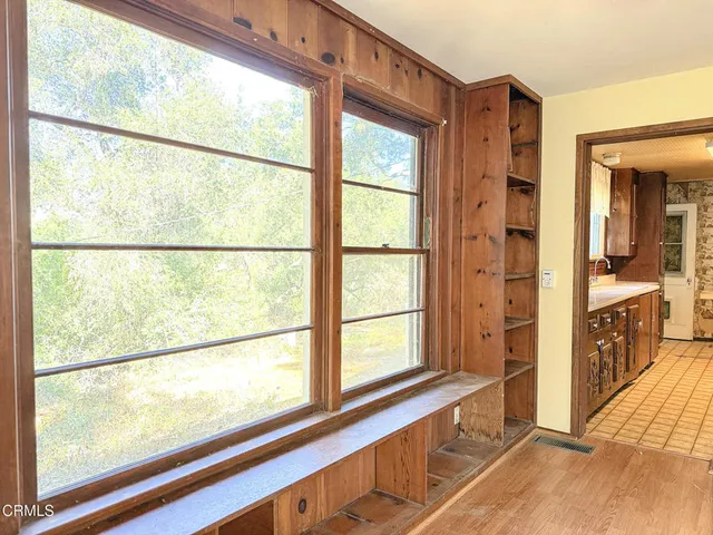 a view of a large room with a large window